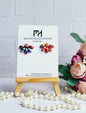 Handmade Floral Polymer Clay Earrings in Warm Tones/Unique Flower-Inspired Earrings with Red and Blue Petals