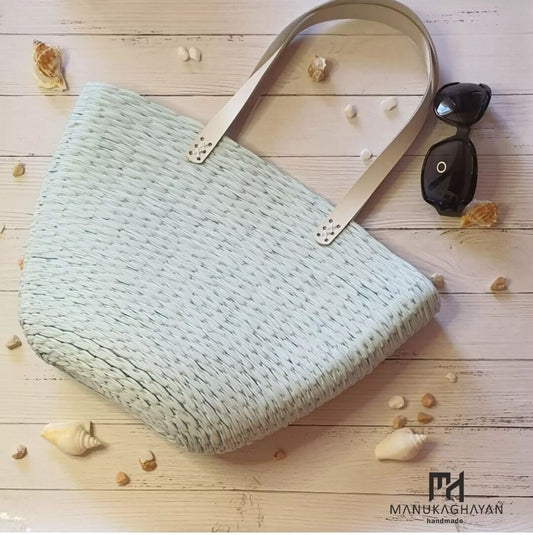 Handmade bag made of high-quality knitted threads